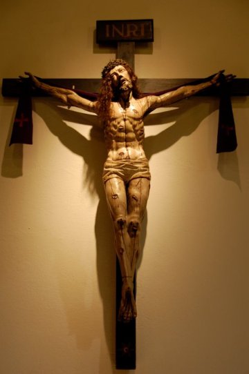 The Christinane symbol of the crucifixion is mundane death.
